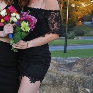 Tight black lace dress